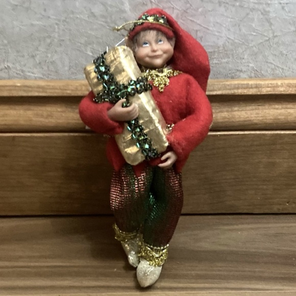 Santa's Workshop Cloth Doll Ornament Holding wrapped gift in gold color #96002 - Picture 2 of 5